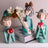Figura Boneca Com Maçã Wolff De Resina 9cm X 9cm X 23cm Cor Colorido
